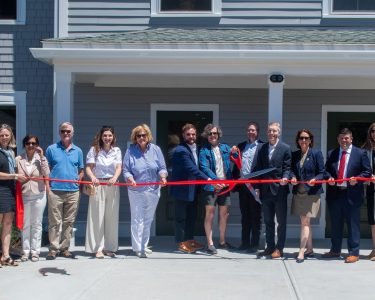 Town and state officals cut the ribbon at Province Post  a 65-unit mixed-income, workforce housing community for families in Provincetown and the Outer Cape